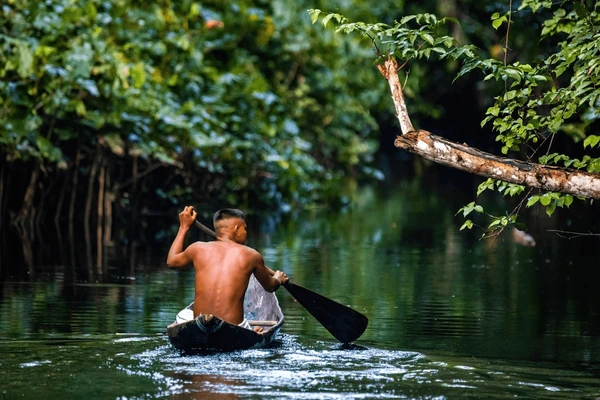 native-tribal-man-swimming-amazonia-600nw-2102452261